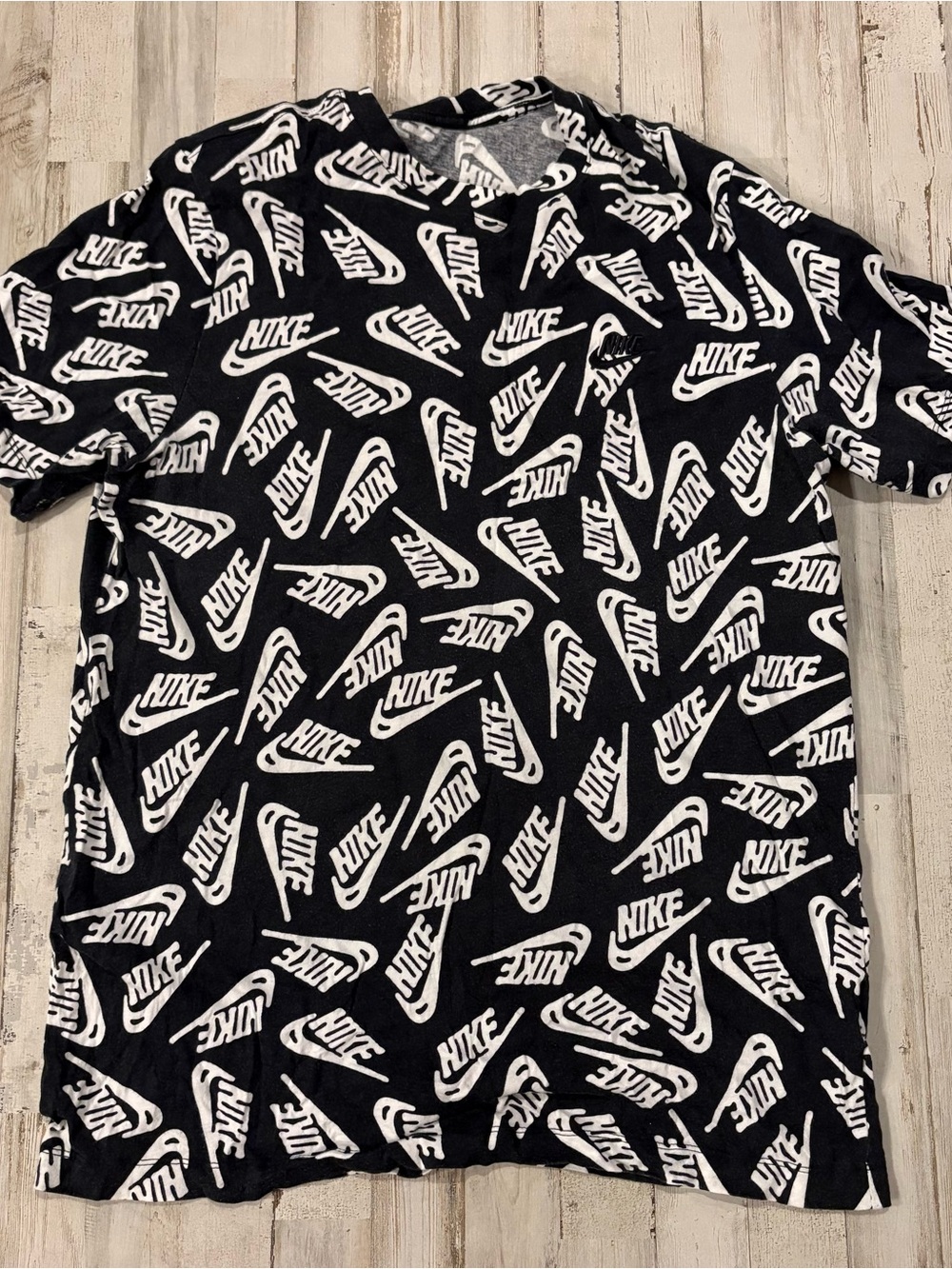 Nike Black Tee with All-Over White Logo Print